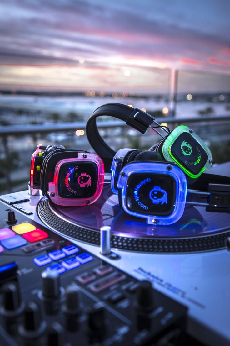 DJ controller with headphone and Denver in the background